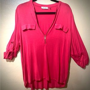 Calvin Klein coral color blouse. Extremely comfortable.
